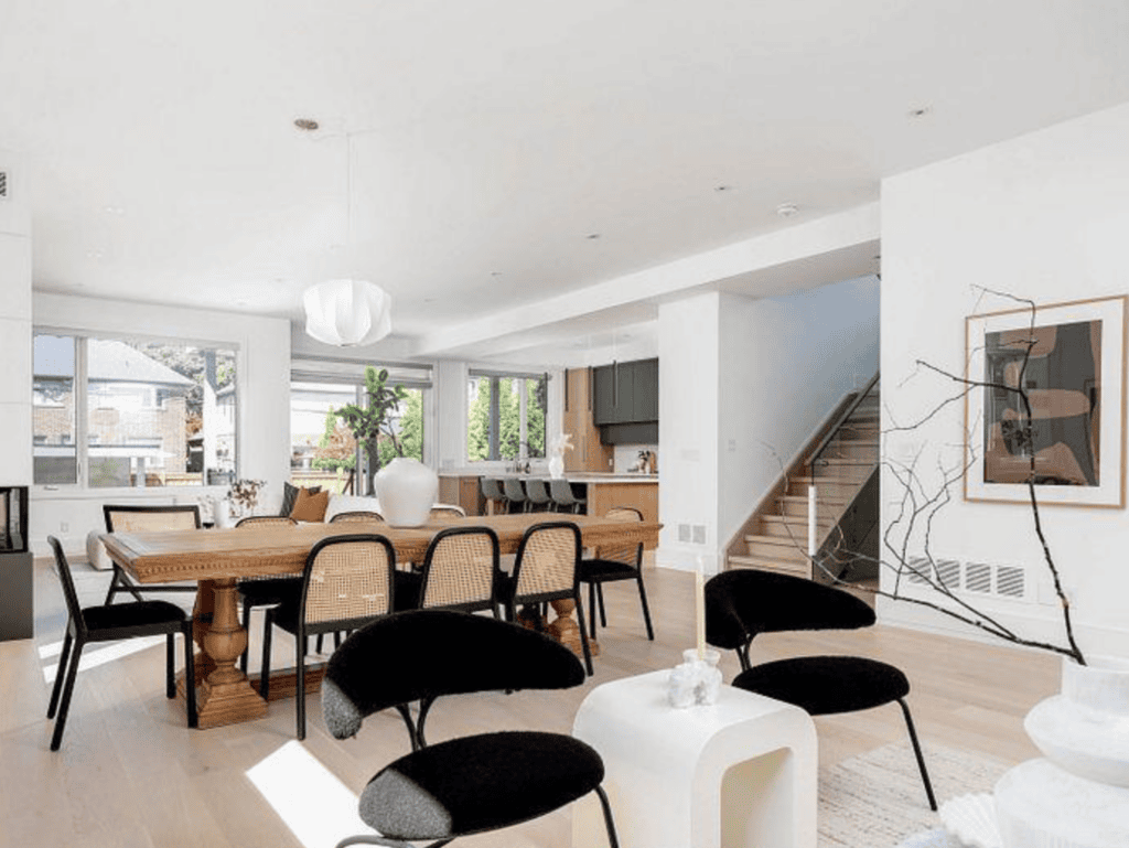 Open-concept living room with 10-foot ceilings and oversized windows at 34 Edgecroft Road in Etobicoke.